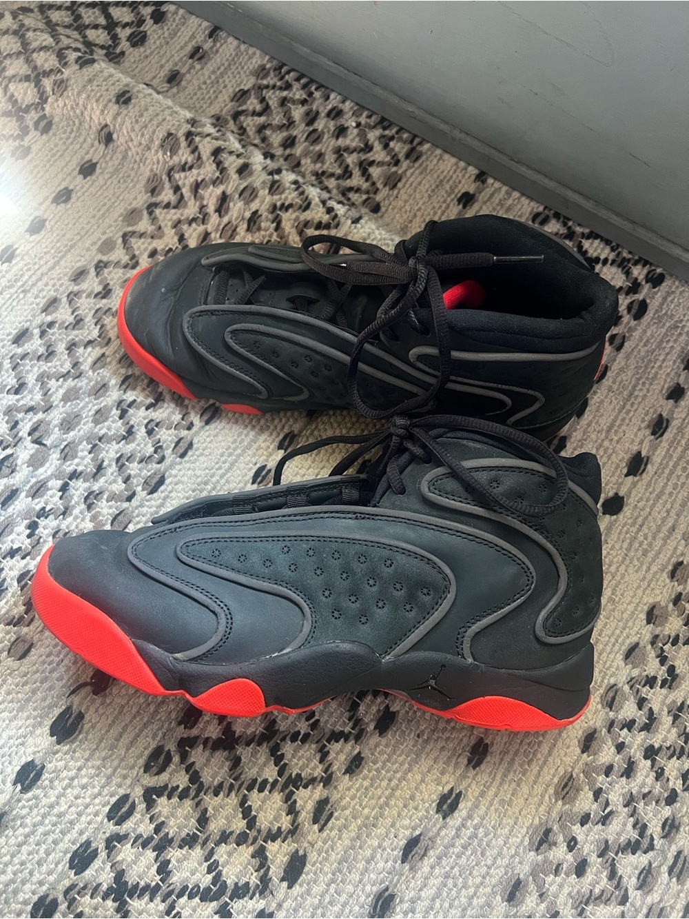 Melody Ehsani Jordan Black and Red High-Top Sneakers